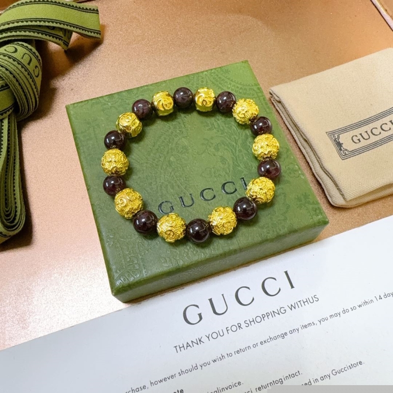 G*u*i bracelets